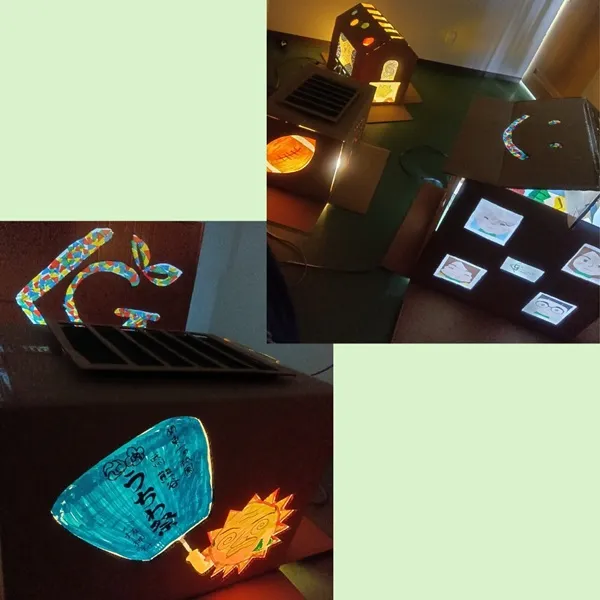 灯りをつけた段ボールハウス