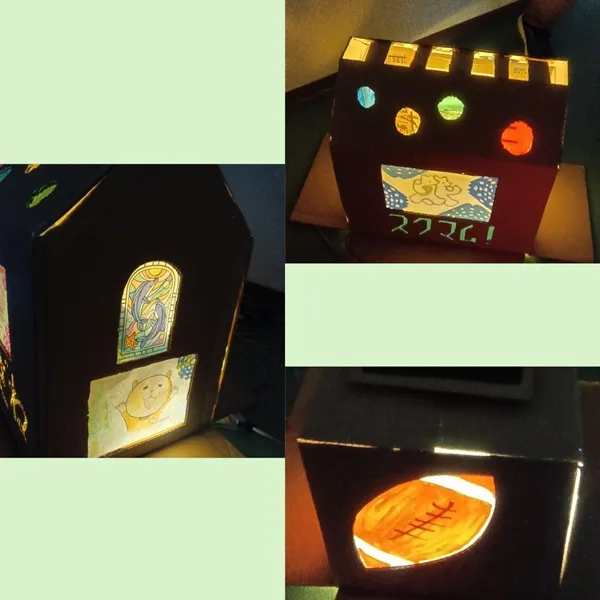 灯りをつけた段ボールハウス